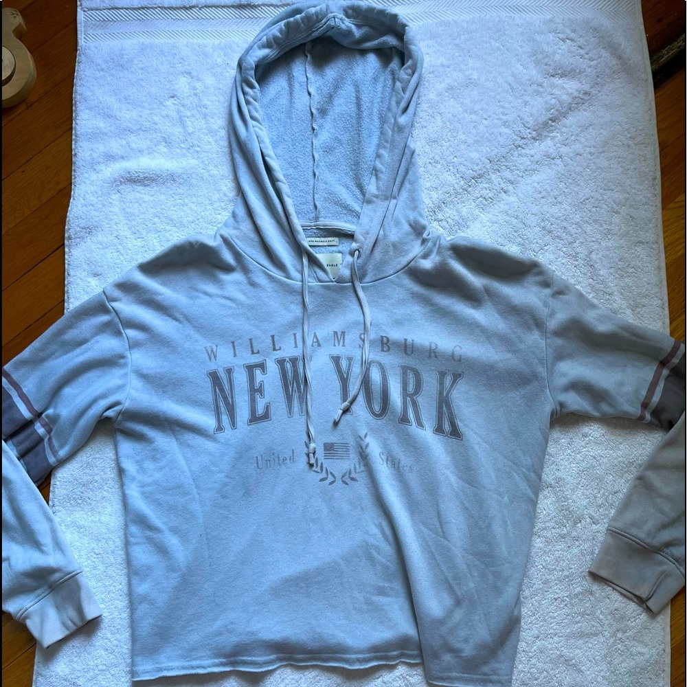American eagle white hoodie with pink and blue stripes size medium